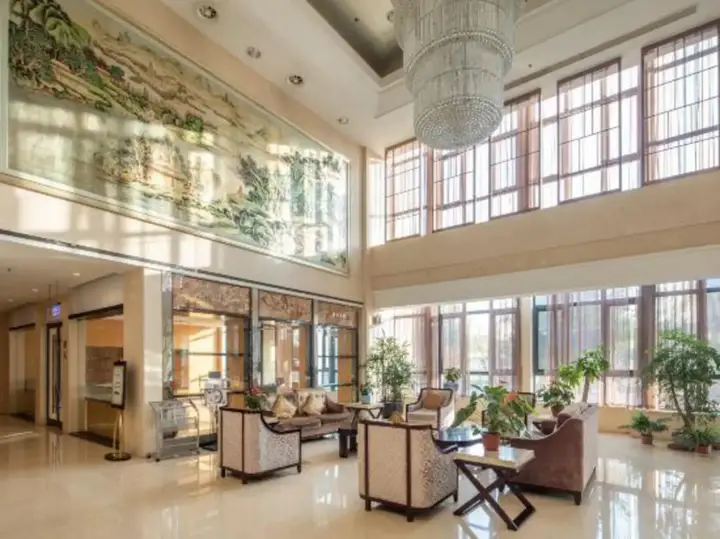 Уси: New Continental June House Hotel