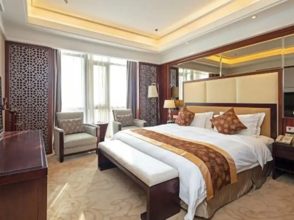 Уси: New Continental June House Hotel