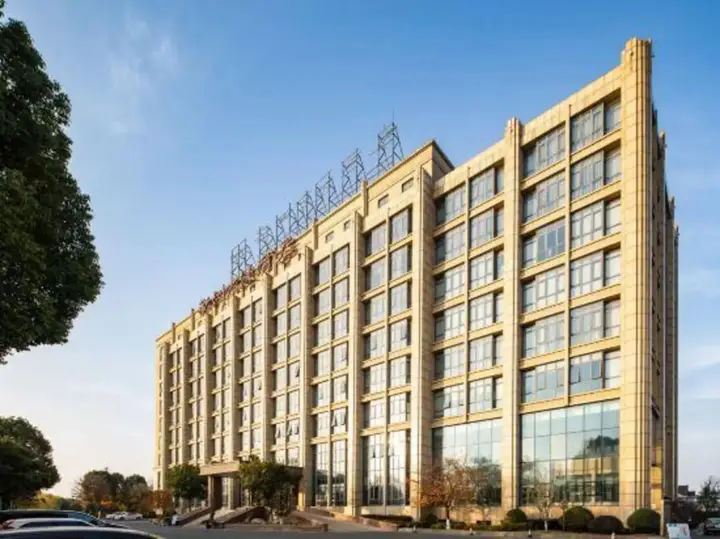Уси: New Continental June House Hotel