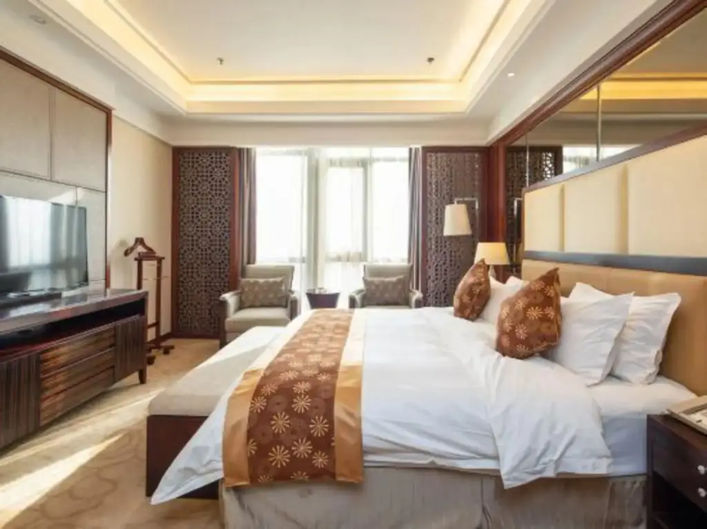 Уси: New Continental June House Hotel