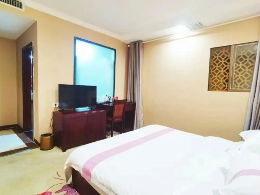 Гуйян: Tuwo Holiday Hotel (Guiyang Railway Station Shachong Road Subway Station)