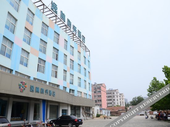 Лиаоченг: Fengjing Business Hotel