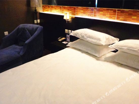 Цицикар: Orange Red Exquisite Hotel (Qiqihar Baihuayuan RT-Mart)