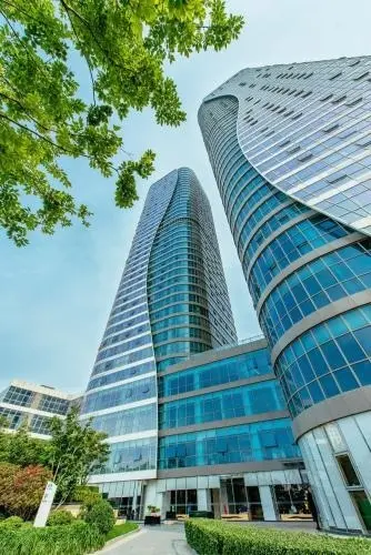 Циндао: Zhonglian Free Harbor Twin Tower Hotel