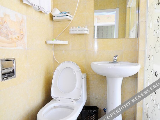 Циндао: Ouzunge Business Hotel