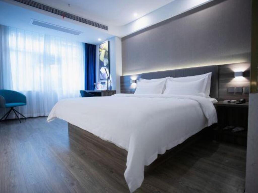 7Days Inn Chain Hotel (Yingshang Lanxing Building Materials Market) — фото 1