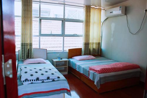 Жичжао: Rizhao Yiyu Fengshang Home Inn