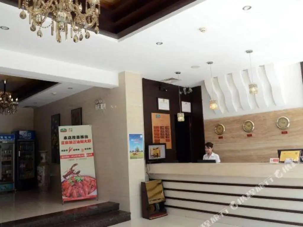 New Lotus Business Hotel (Taojialing Metro Store Renxinhui) — фото 1