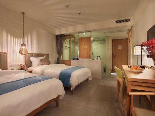 Яншо: Kumquat Hotel Yangshuo