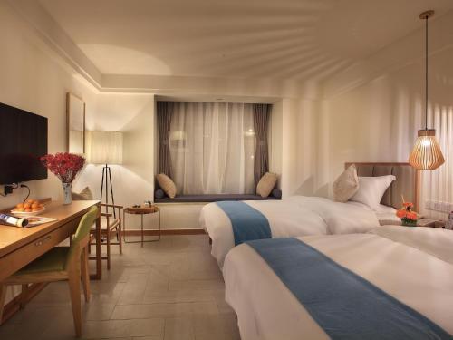 Яншо: Kumquat Hotel Yangshuo