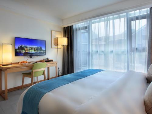 Яншо: Kumquat Hotel Yangshuo