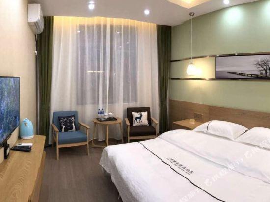 Дали: Tianfu Tenglong Business Hotel