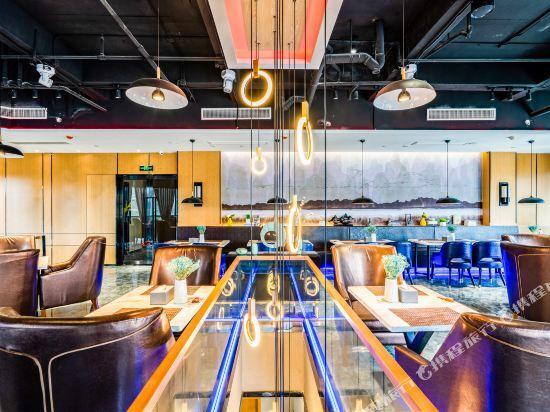 Ханчжоу: Отель Xinyi Holiday Hotel Puyan Road