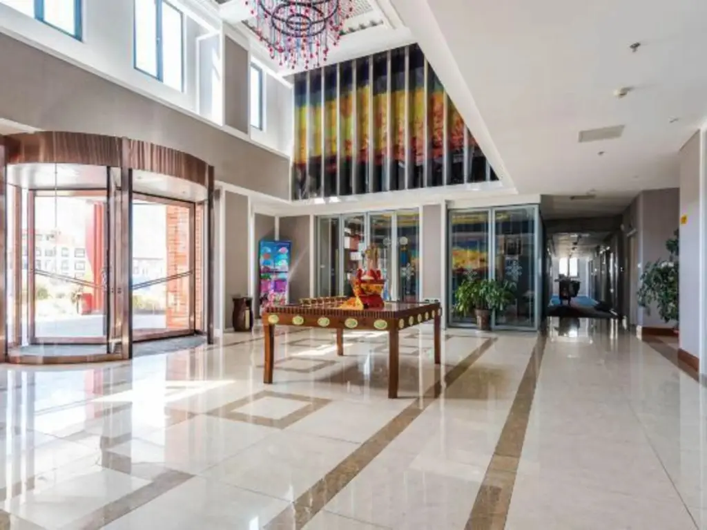 Линжи: Gela Dandong Business Hotel (VIP Building)