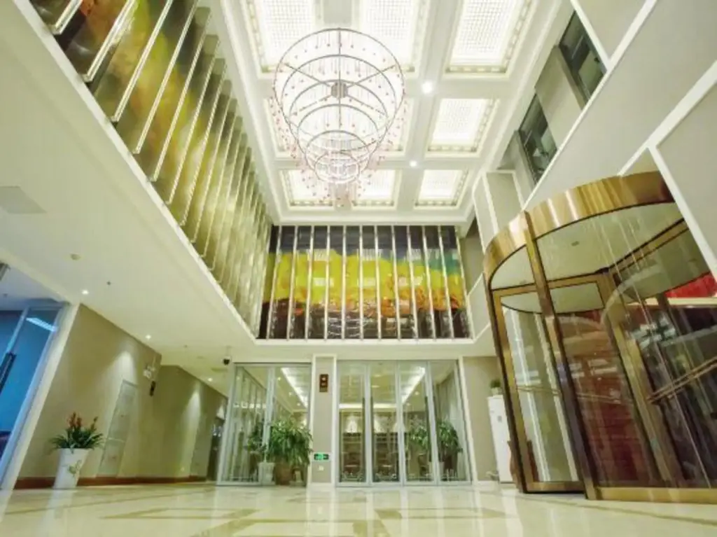 Линжи: Gela Dandong Business Hotel (VIP Building)