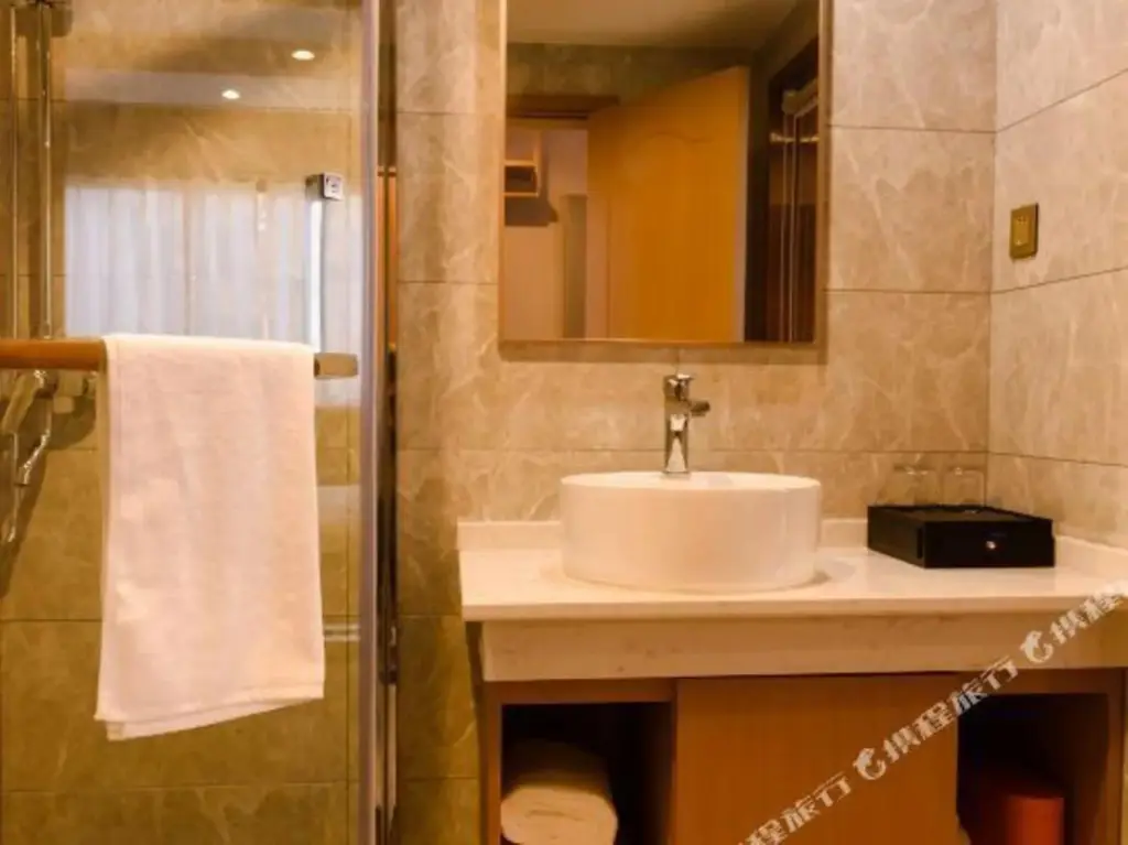 Уси: Guibao Hotel