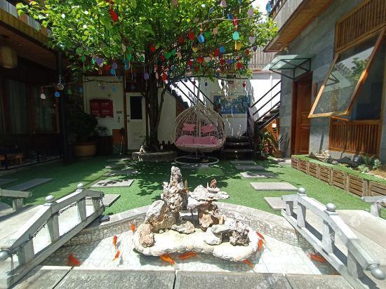 Дали: Quwanba Yuexi Inn