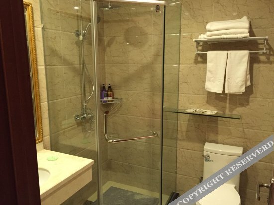 Уси: Wanzai Matou City Hotel