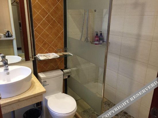 Уси: Wanzai Matou City Hotel