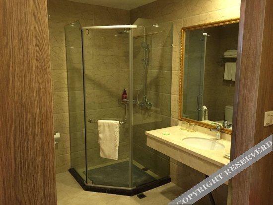 Уси: Wanzai Matou City Hotel