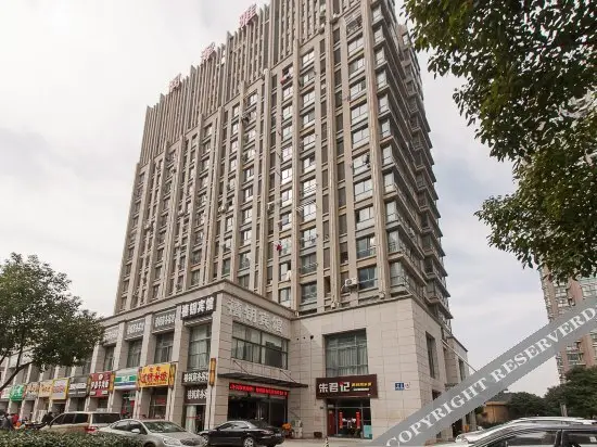 Уси: Xiyue Business Hotel