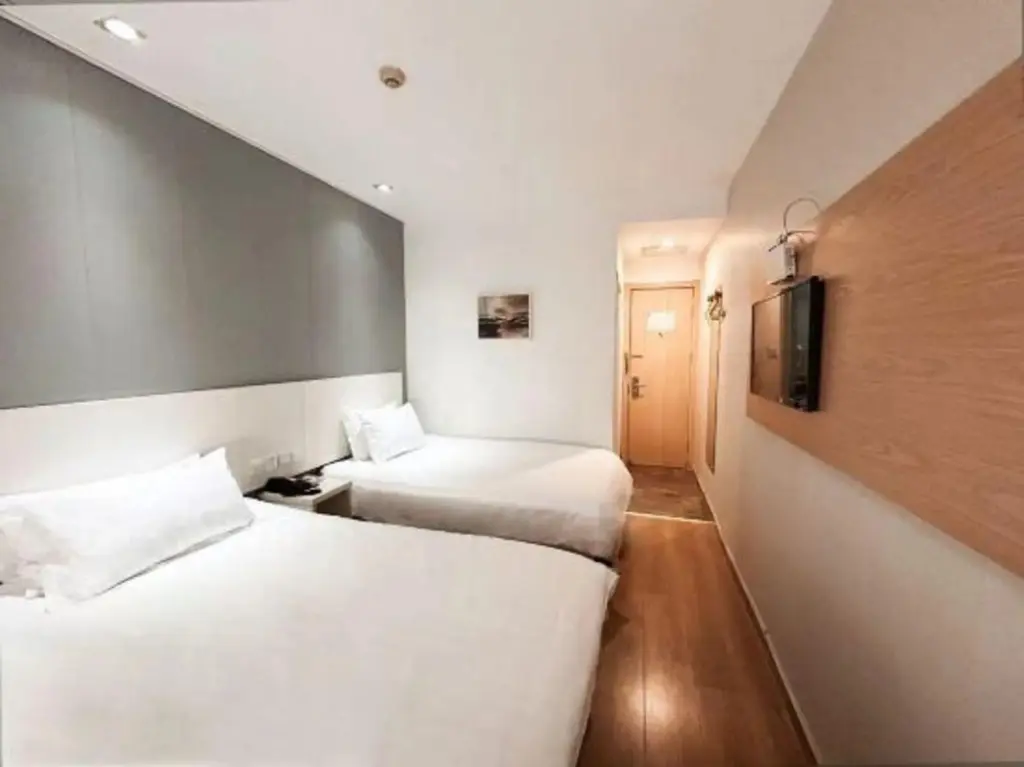Цзыбо: Homeinn Pebble Hotel (Zibo Wangfujing Badaju)