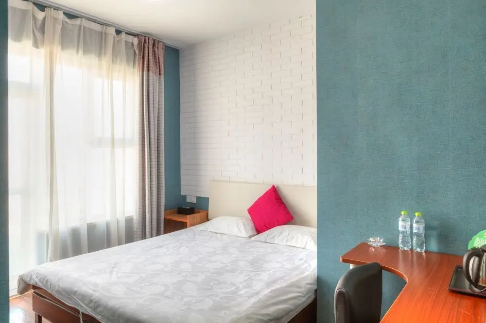 Циндао: Qingdao Proud House