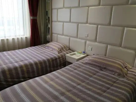 Циндао: Aike 100 Theme Hotel (Qingdao Chongqing North Road Liuting Subway Station)