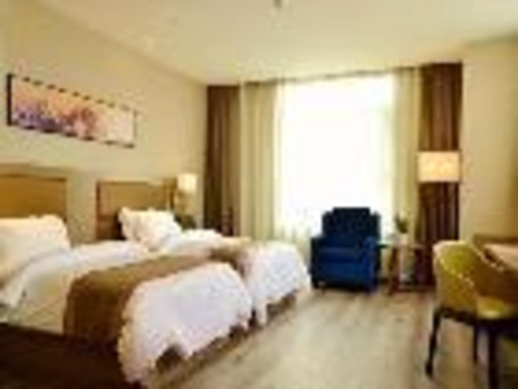 Циндао: Jinjiang Metropolo Hotel - Qingdao Xinduxin