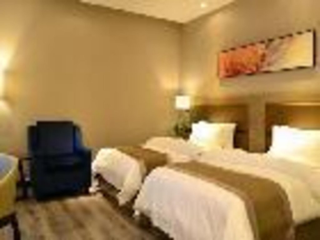 Циндао: Jinjiang Metropolo Hotel - Qingdao Xinduxin