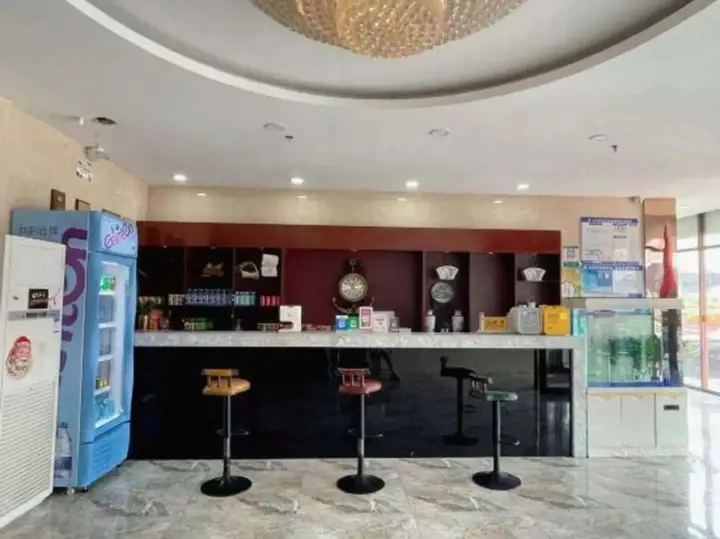 Линьи: Huanle Business Hotel