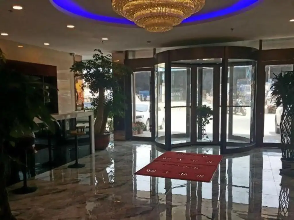 Линьи: Huanle Business Hotel