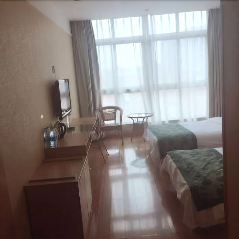 Циндао: Gelai Business Hotel