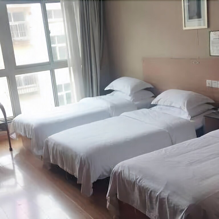 Циндао: Gelai Business Hotel