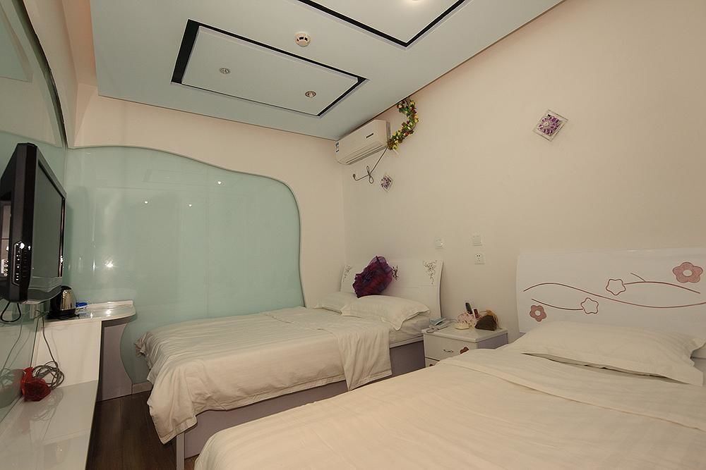 Циндао: Qingdao Sweet Space Business Hotel