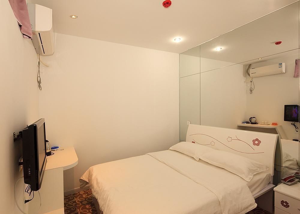 Циндао: Qingdao Sweet Space Business Hotel