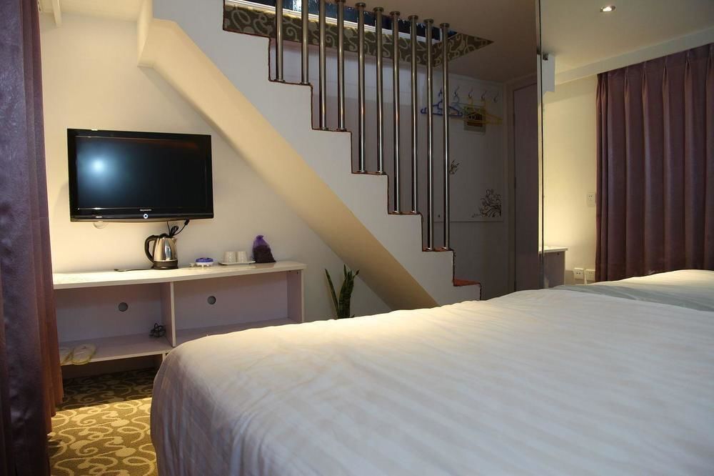 Циндао: Qingdao Sweet Space Business Hotel