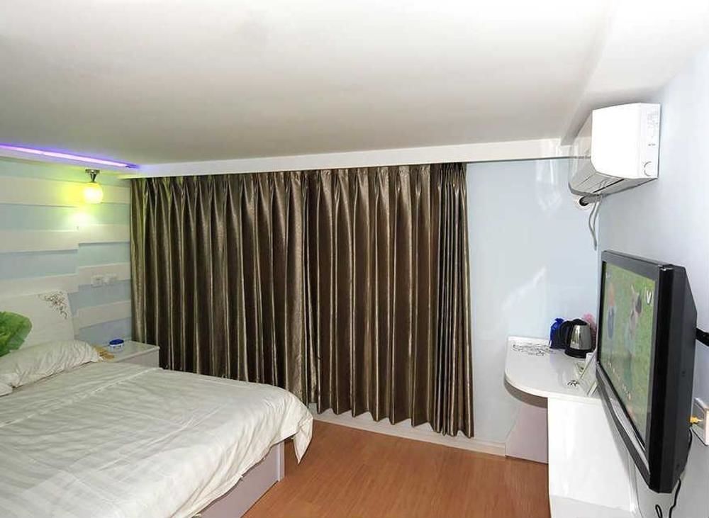 Циндао: Qingdao Sweet Space Business Hotel