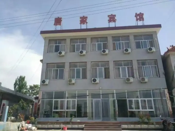 Линьи: Tangjia Hotel