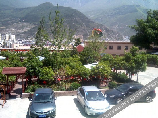 Фэньи: Xinjiayuan Holiday Hotel