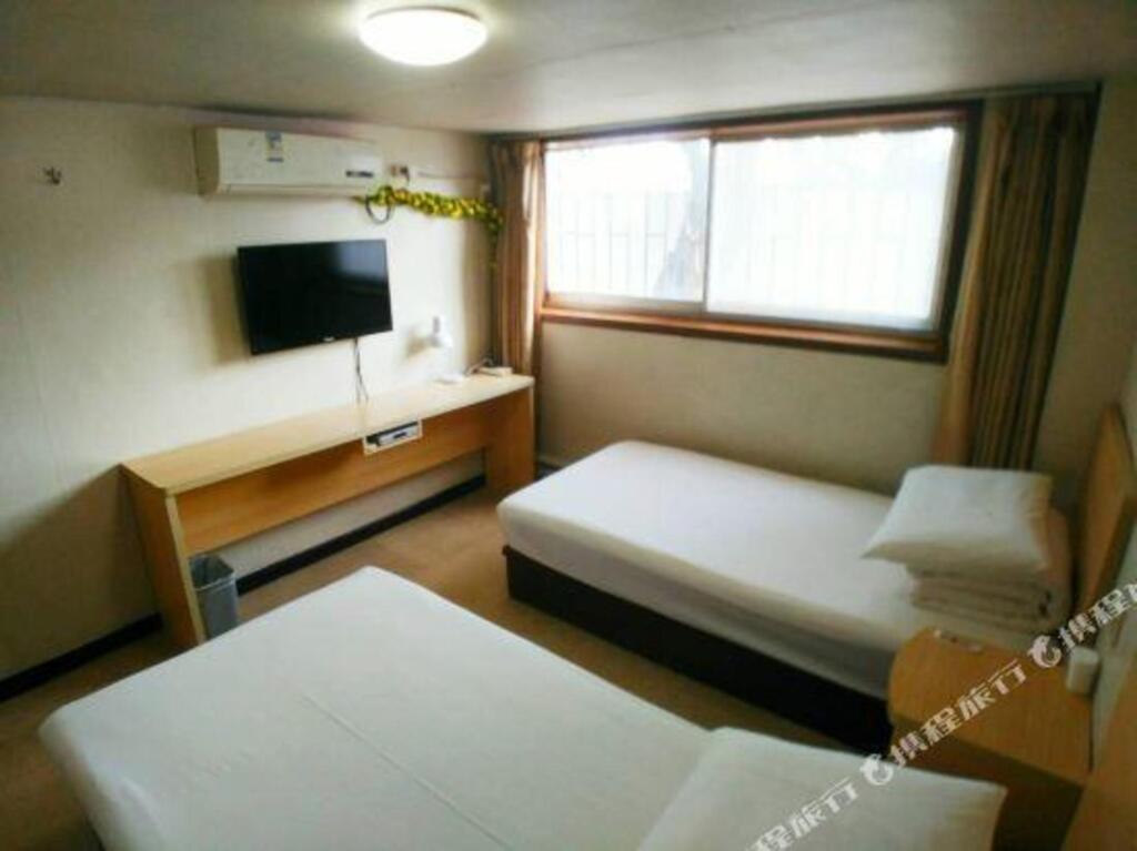 Циндао: Yirenju Hotel
