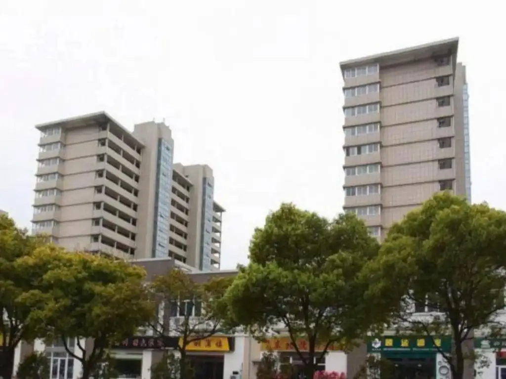 Наньтун: Xinding Business Hotel