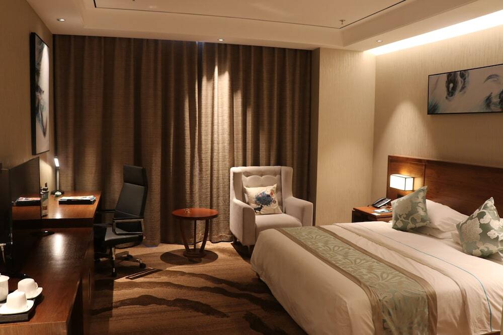 Яньтай: Yantai Dexin International Hotel