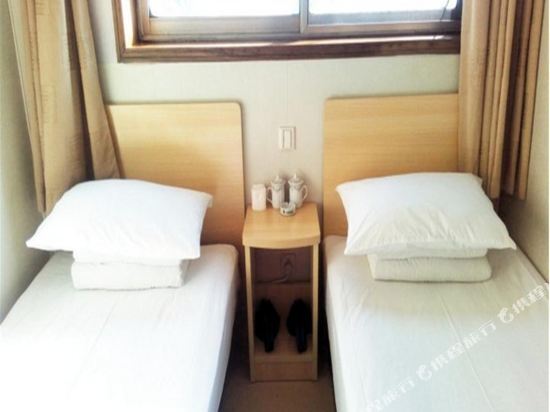 Циндао: Kaixinyuan Hostel