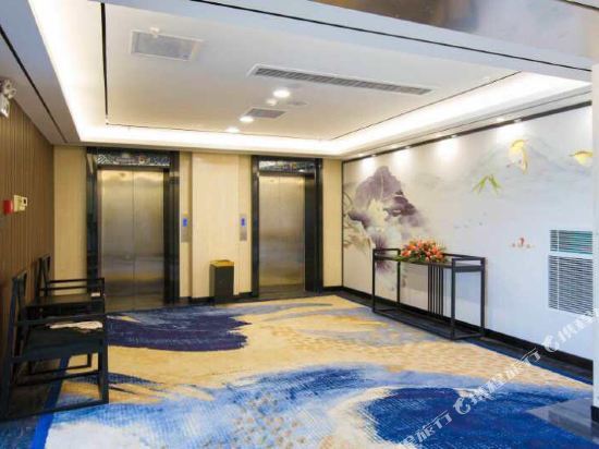 Уси: Sunmart Hotel