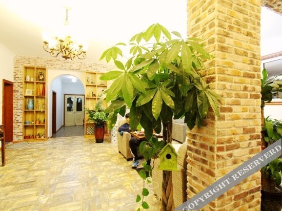 Циндао: Qingdao Mushe Hotel