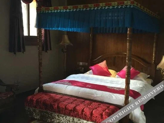 Фэньи: Qiangwang Guanzhai Qiangwenhua Theme Hotel