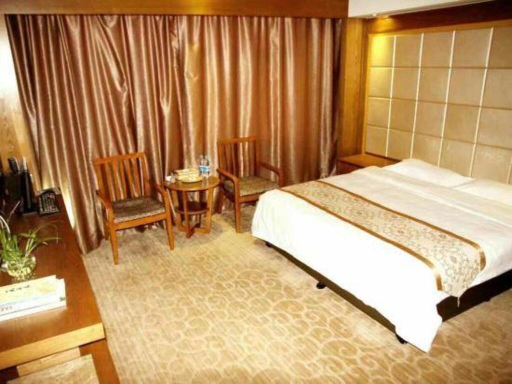 Сицзяопо: Caishen Hotel
