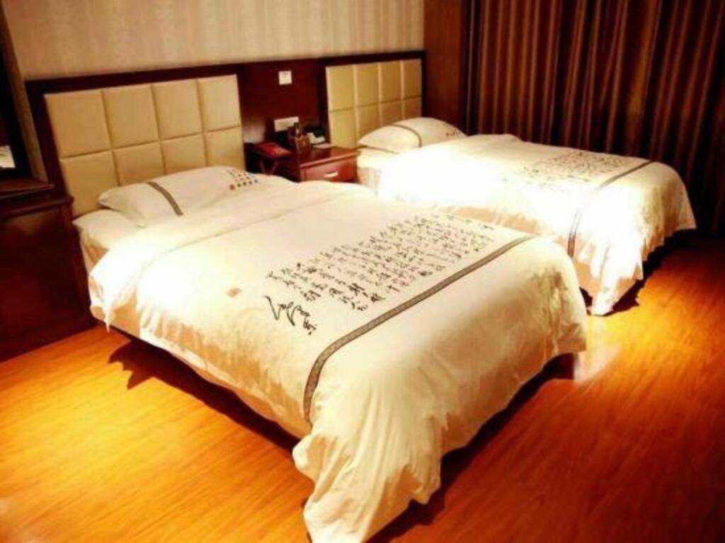 Сицзяопо: Caishen Hotel