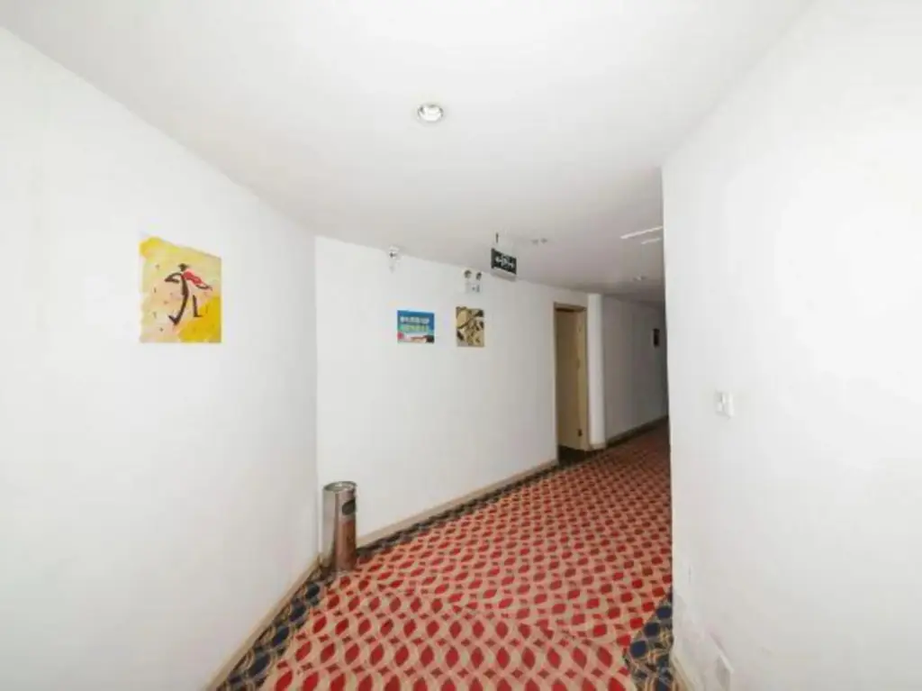 Шаоксинг: Paojiang Xinyuansu Business Hotel